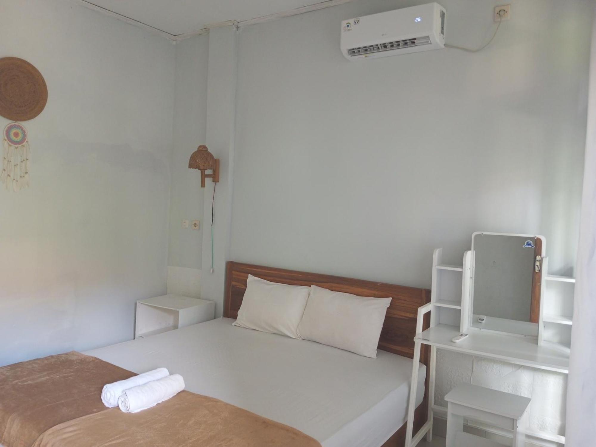 Kri Homestay Kuta  الغرفة الصورة